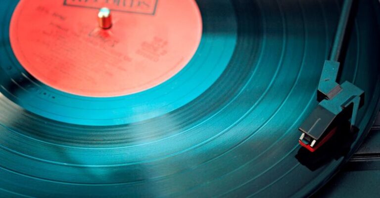 Turntable - Blue Vinyl Record Playing on Turntable