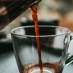 Pressings - Photo of Man Pouring Coffee