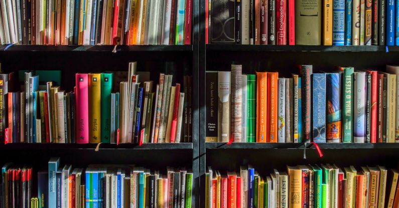 Library - Books in Black Wooden Book Shelf