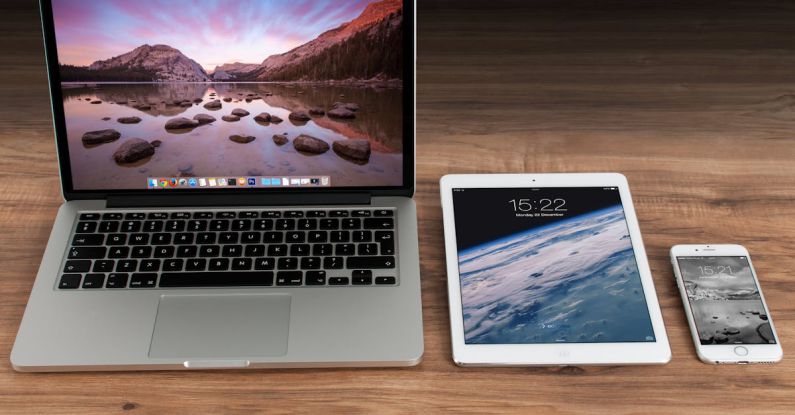 Devices - Macbook Pro Beside White Ipad