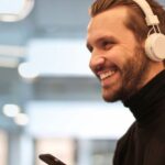 Headphones - Man Wearing White Headphones Listening to Music