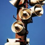 Speakers - Megaphone Speakers on Wooden Post