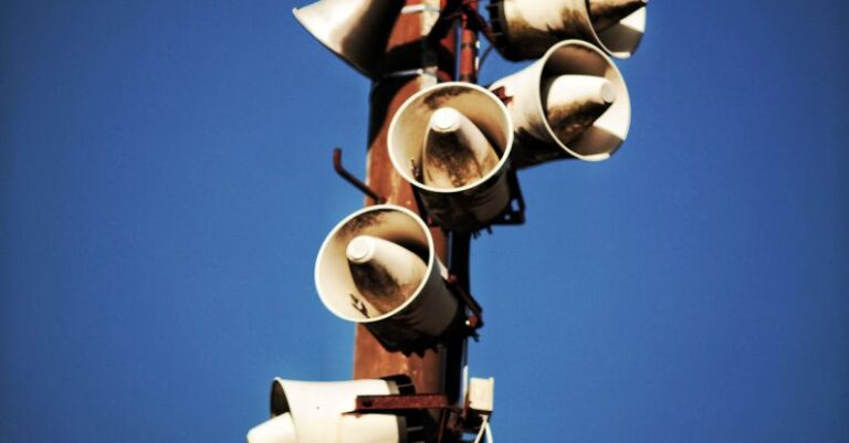 Speakers - Megaphone Speakers on Wooden Post